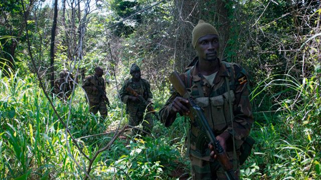 STILL SEARCHING. Soldiers of the Uganda People's Defense Force (UPDF) patrol in the jungle in the Central African Republic as they look for Lord's Resistance Army (LRA) fighters on June 24, 2014. File photo by Michel Sibiloni/AFP