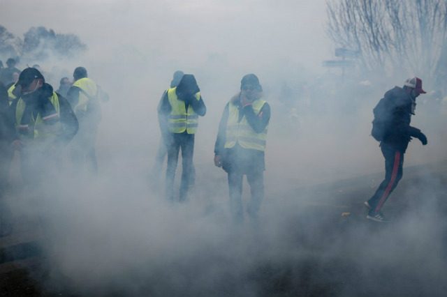 ‘Yellow vests’ storm French ministry as protests turn violent
