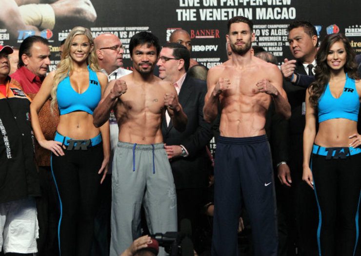Manny Pacquiao and Chris Algieri pose on the stage after the weigh-in. Photo by Chris Farina - Top Rank