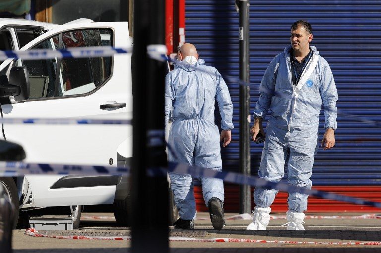 FINSBURY PARK ATTACK. Forensic officers work at the scene in Finsbury Park area of north London after a vehichle hit pedestrians, on June 19, 2017.Photo by Tolga Akmen/AFP 