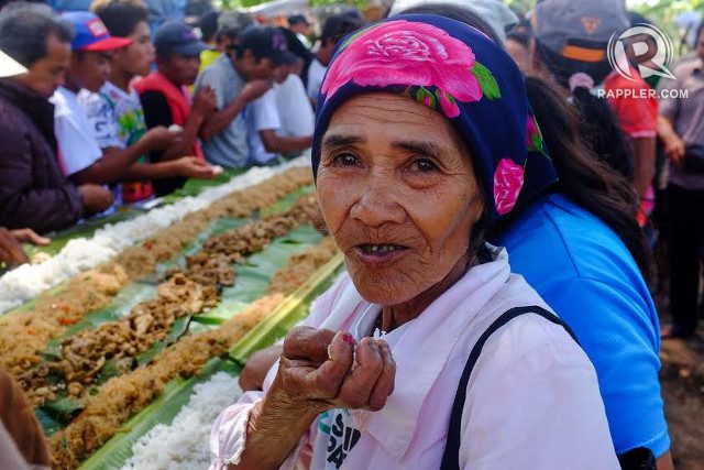MINDANAO'S HUNGER. Farmer Nomeriana Nacario says she now offers her services at the weekend market in the city center of Tagoloan in exchange for a sack of rice. Photo by Bobby Lagsa/Rappler 