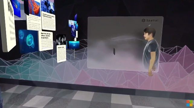 MEETING. A HoloLens user remotely addresses two other people with his hologram. Screenshot from livestream 
