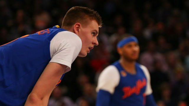 HE'S GOT THIS. While Carmelo Anthony watches from the bench, Kristaps Porzingis takes over for the Knicks. Mike Stobe / GETTY IMAGES NORTH AMERICA / AFP 