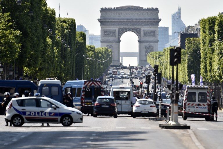 Car plows into police van in Paris Champs-Elysees ‘attack’