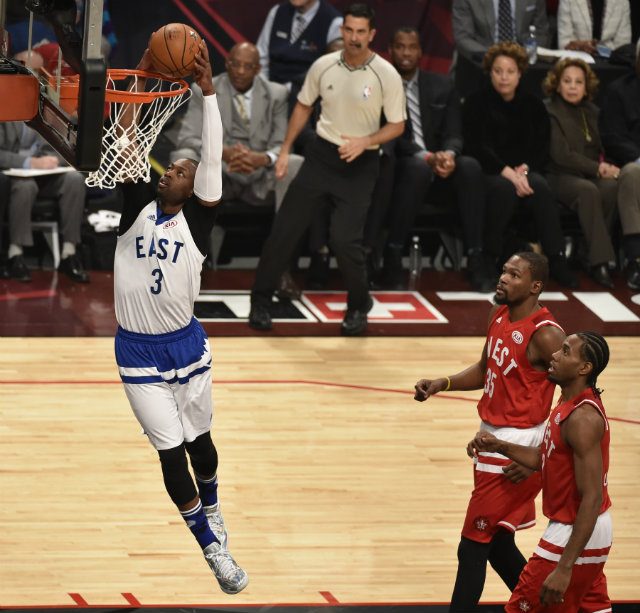 LEAP HIGH. Dwyane Wade dunks the ball during the 2016 NBA All-Star Game. Photo by Warren Toda/EPA  