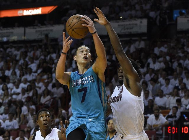 Hornets snap playoff skid with win over Heat