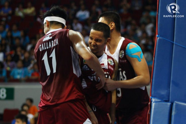 JR Gallarza and Mikee Reyes embrace during their rout of Adamson