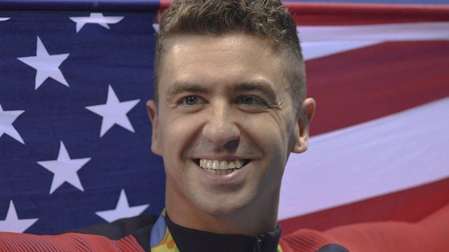 Olympic champion Ervin kneels during U.S. anthem