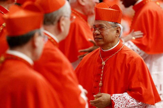 MINDANAO'S CARDINAL. Cotabato Archbishop Orlando Quevedo officially becomes the first cardinal from Mindanao during a ceremony led by Pope Francis on Feb 22, 2014. Photo by Fabio Frustaci/EPA