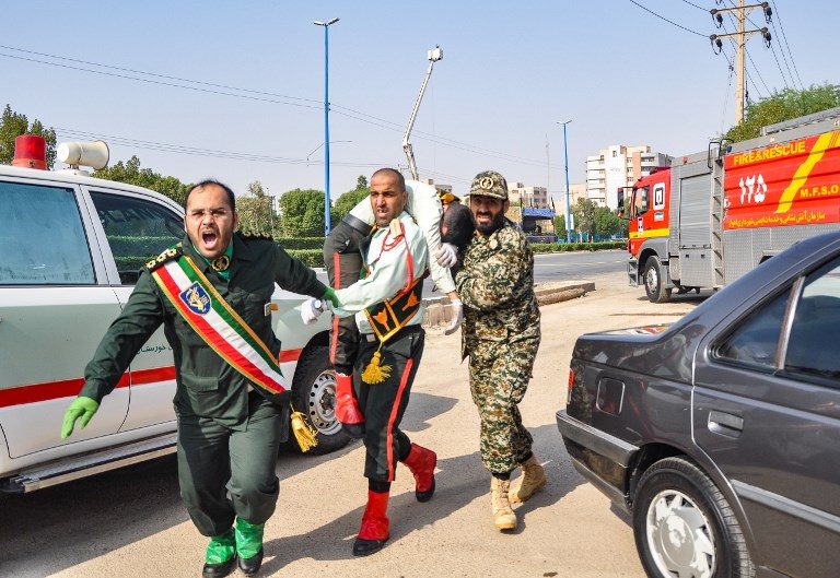 Iran vows ‘crushing response’ after gunmen kill 29 at army parade