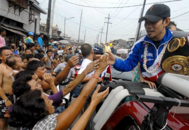 Donaire, seen during a 2009 motorcade in Manila after his win over Rafael Concepcion, will make a mandatory defense of his WBO junior featherweight title against Jessie Magdaleno. File photo by Junie Doctor/AFP 