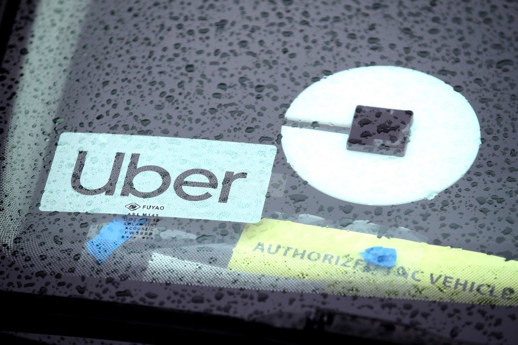Uber steers toward blockbuster IPO as road looks rocky