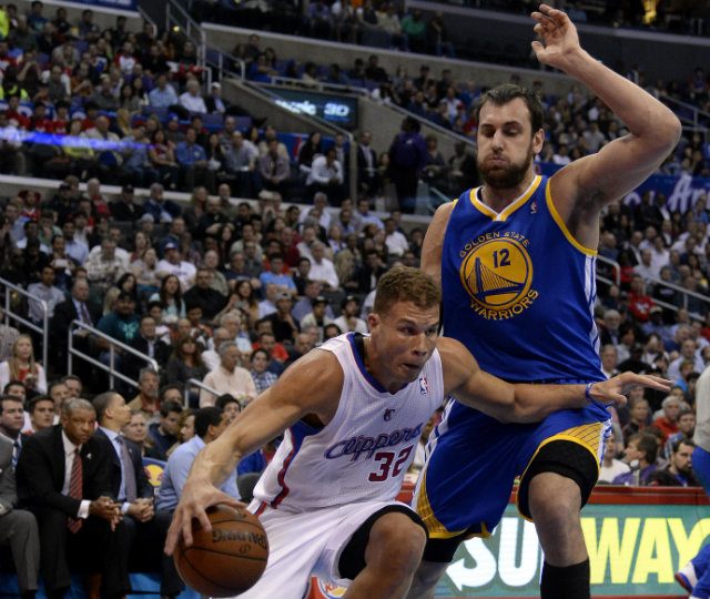 Stopping LA's Blake Griffin (L) in the post will be a major task for Golden State's Andrew Bogut (R). Photo by Michael Nelson/EPA