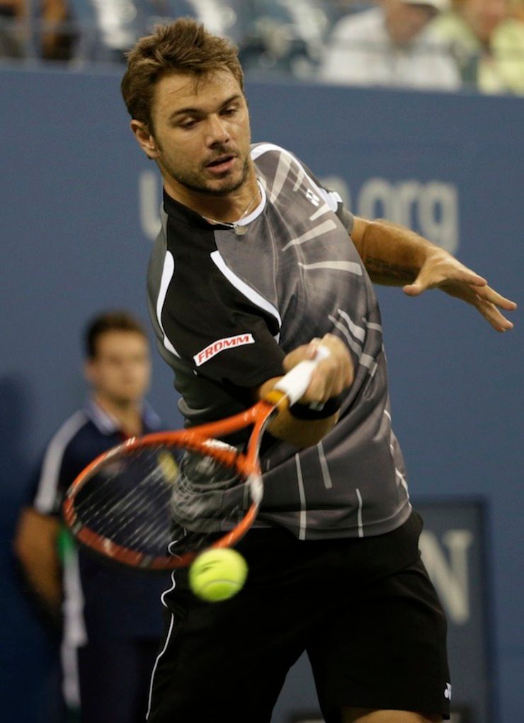Stan Wawrinka hits a return to Thomas Bellucci during the 2014 US Open Tennis Championship at the USTA National Tennis Center in Flushing Meadows, New York, USA, 27 August 2014. Peter Foley/EPA