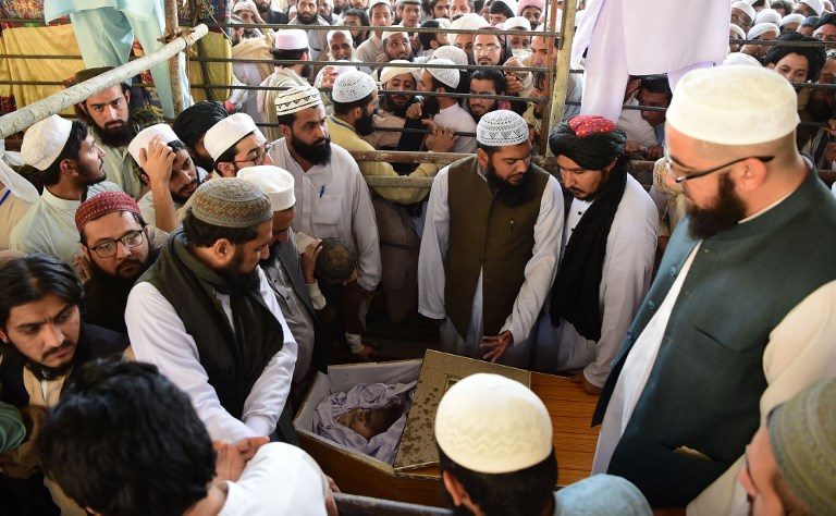 Pakistan buries ‘Father of Taliban’ as PM orders probe of killing