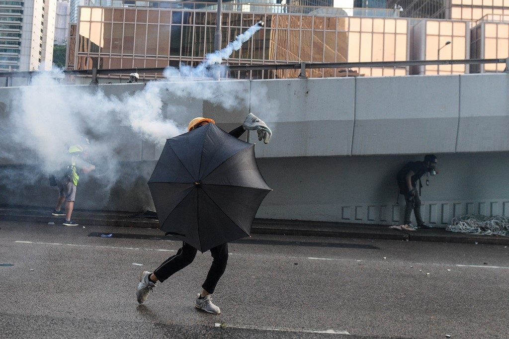 Hong Kong returns to violence with tear gas and molotovs