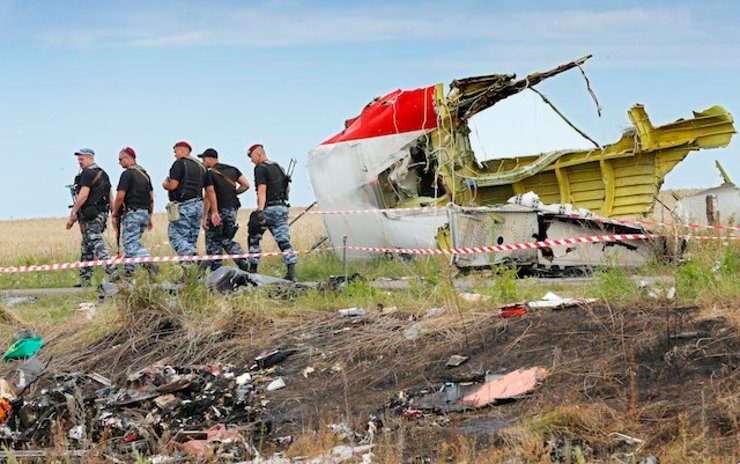 MH17 investigators turn back after explosions
