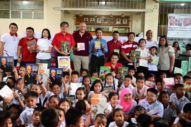FOR A BRIGHTER FUTURE. MoneyGram's 'Inspiring Minds with the Gift of Literacy' project aims to give 50,000 new books to 100 schools. 