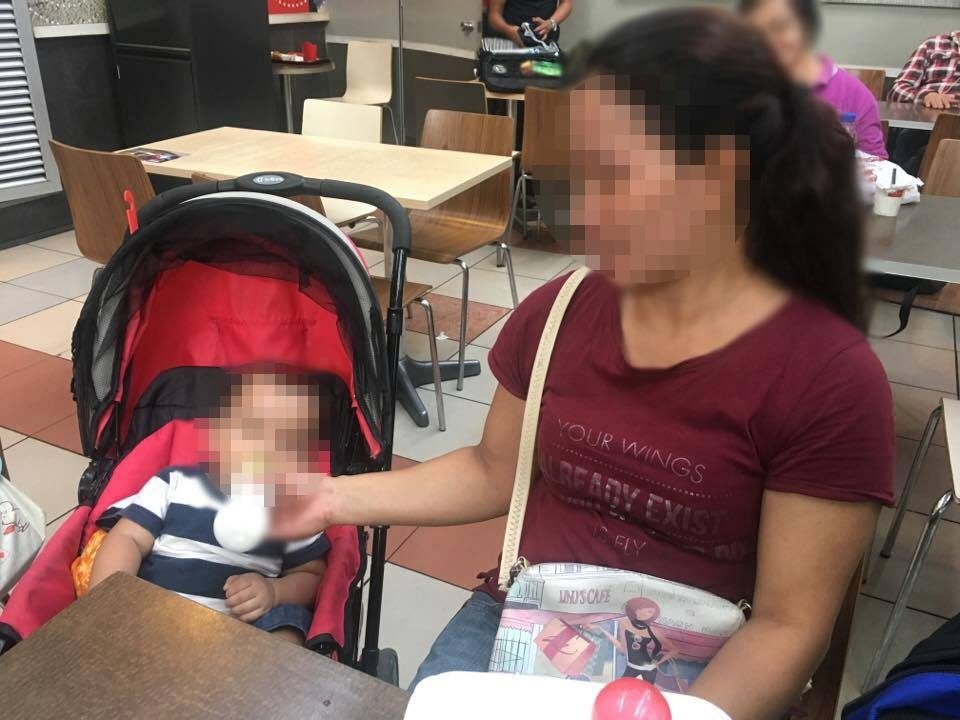 STATELESS. Undocumented OFW Erika and her 11-month old baby, who is not a registered national of any country. Photo by Camille Elemia/Rappler  