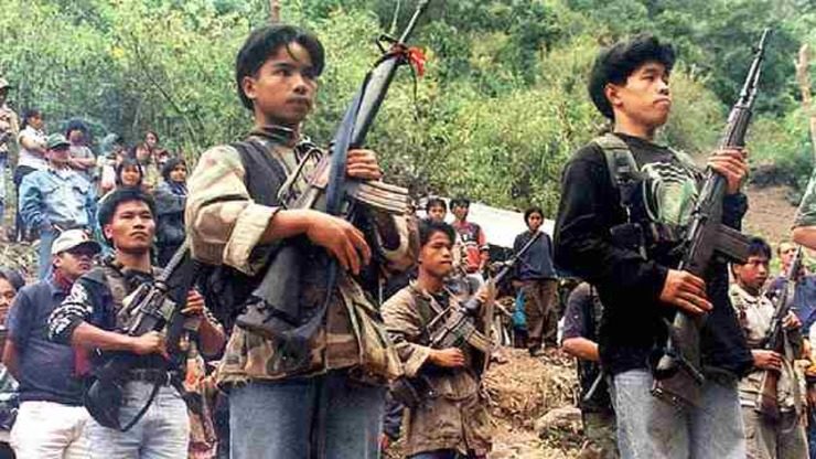 PEACE TALKS SOON?. Picture dated 29 March 2002 shows NPA guerrillas at a clandestine assembly in the Cordillera region in northern Philippines. File photo by Agence France-Presse