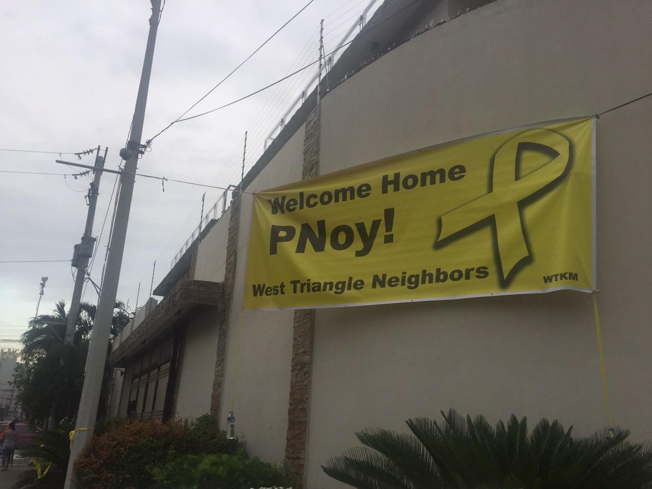 IN PHOTOS: QC neighbors welcome Aquino back