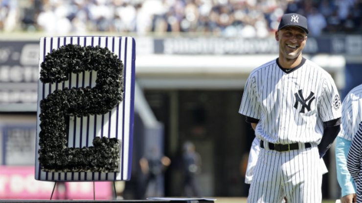 New York Yankees captain Derek Jeter acknowledges the crowd during 'Derek Jeter Day' on September 7. Photo by Jason Szenes/EPA
