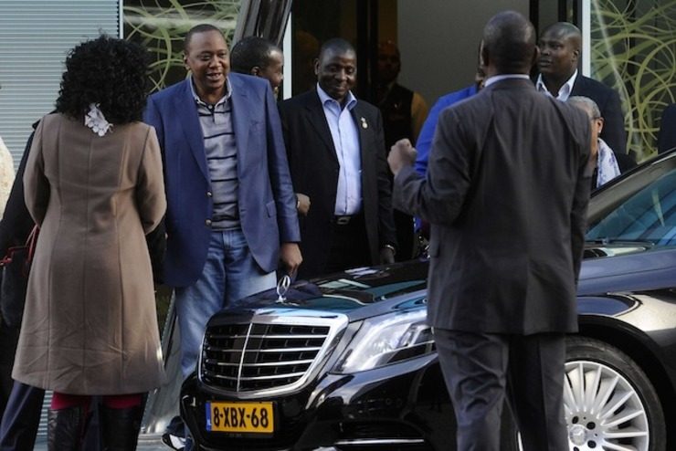 President Uhuru Kenyatta of Kenya (2nd L) during his arrival at Schiphol Airport in The Netherlands, 07 October 2014. Evert Elzinga/EPA