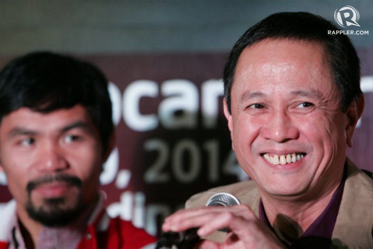 PBA commissioner Chito Salud flashes a smile as Pacquiao looks on