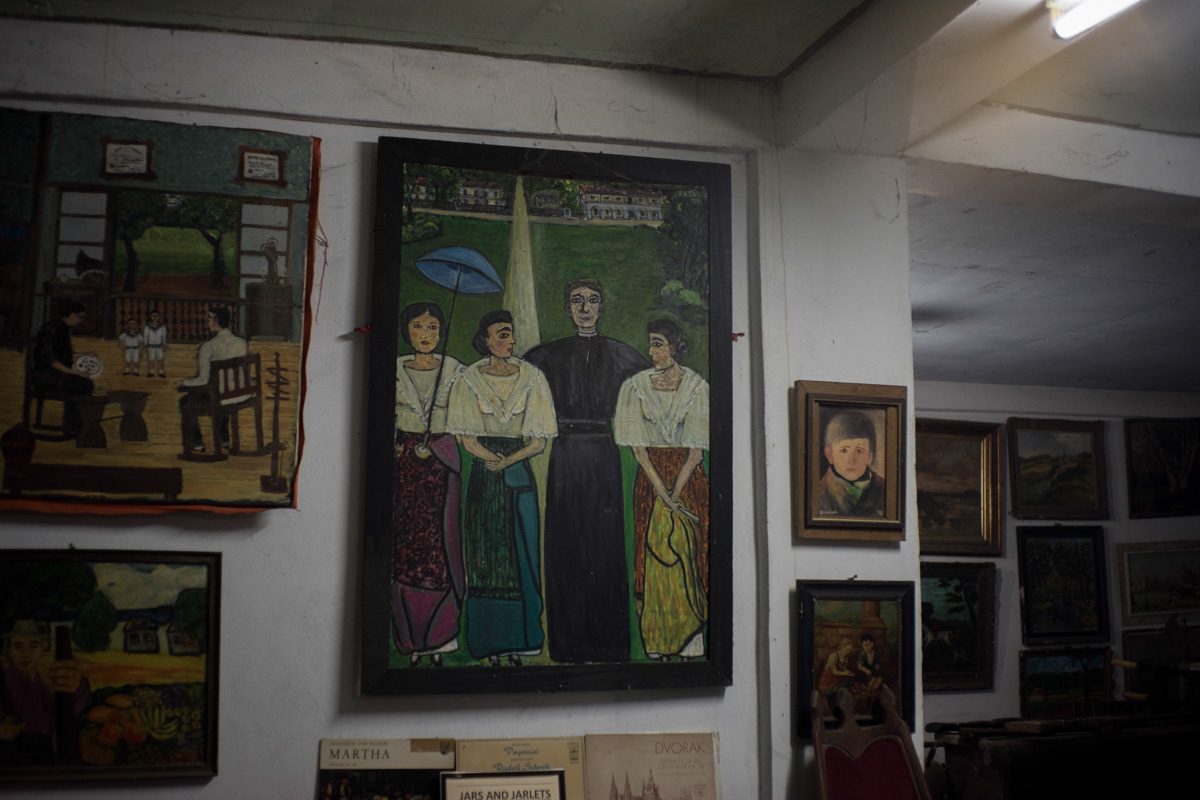 FAMILY HISTORY. The Carino family in Tayum traces their roots to the 3 daughters of the priest assigned in the poblacion, as shown in Ambassador Rosario Cariño''s painting (center). Photo by Maverick Asio  