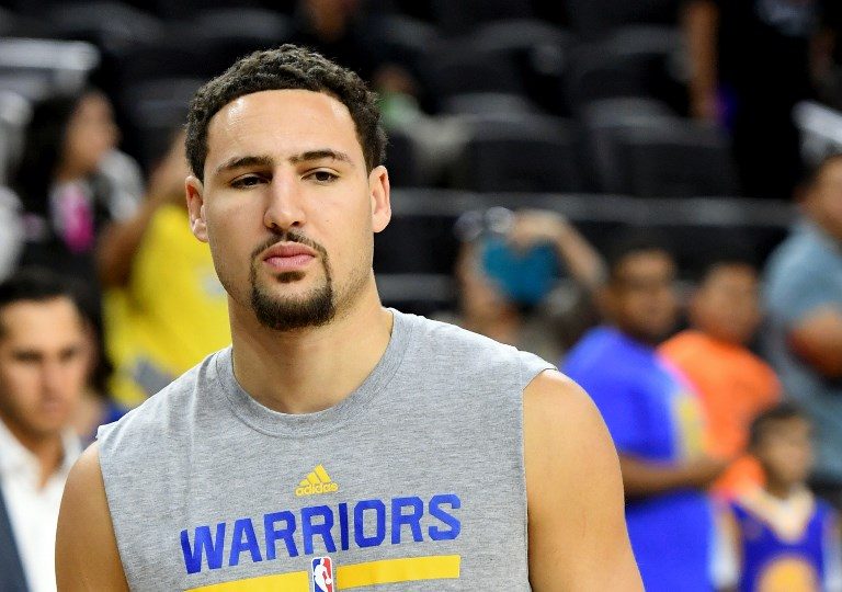 WATCH: Klay Thompson falls after missing 360 dunk in China