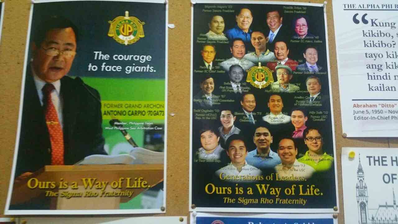 FRATERNITY. Loon (in white, below logo) with other fraternity members Justice Antonio Carpio (left photo), former Solicitor General Simeon Marcelo (in black, to the left of Loon), and former Defense Secretary Avelino 'Nonong' Cruz (in black, to the right of Loon) in a poster in UP campus. Photo by Camille Elemia/Rappler