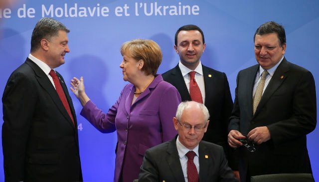 EU signs association accords with Ukraine, Georgia, Moldova