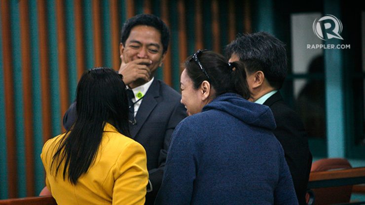 LAUGHTER. Janet Lim-Napoles laughs with her lawyers inside a court room in the Sandiganbayan. File photo by Ben Nabong/Rappler