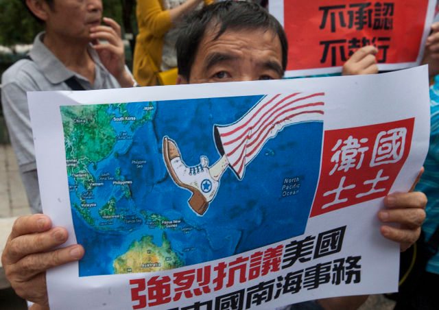 China vows ‘decisive response’ to sea provocations