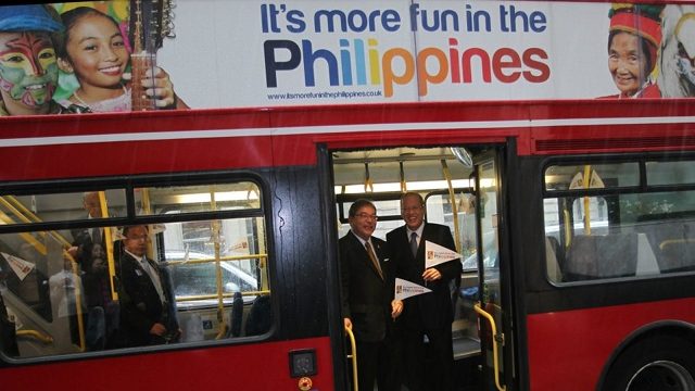 FILE PHOTO. President Benigno Aquino III with Tourism Secretary Ramon Jimenez Jr ride the London bus in a photoshoot for the 'It's more fun in the Philippines' tourism campaign in London. (Malacanang Photo Bureau) 