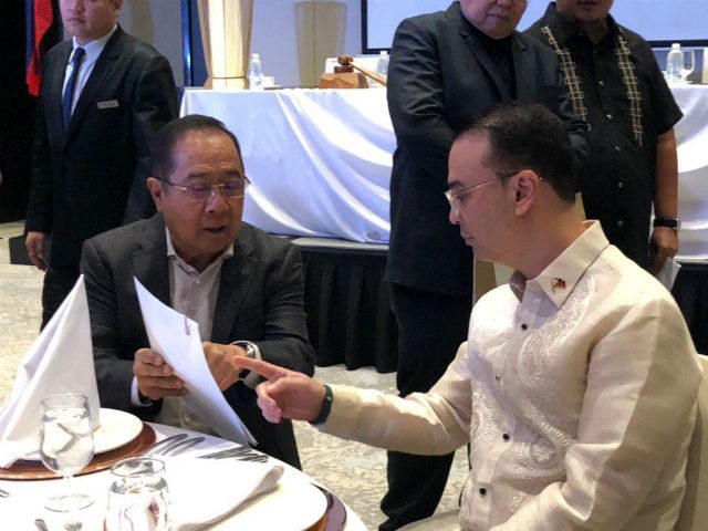 ALLIES. NUP chairman Ronnie Puno talks to Speaker Alan Peter Cayetano during the party's meeting. Photo by Mara Cepeda/Rappler 