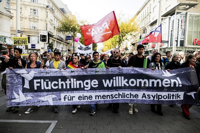 Thousands march in support of migrants in Vienna