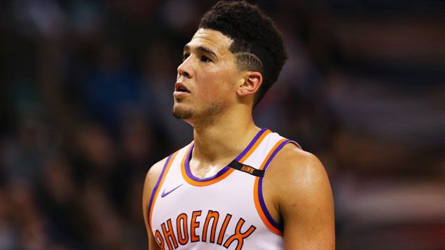 Devin Booker shines for Suns but Celtics roll on