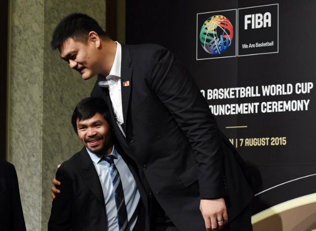 Yao Ming greets Manny Pacquiao prior to their photo session of the media availability in the 2019 FIBA Basketball World Cup host announcement ceremony in Tokyo. Photo from TOSHIFUMI KITAMURA/AFP 