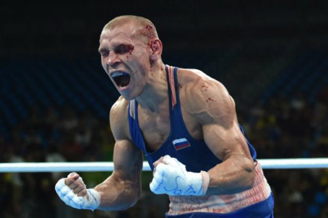 Russian boxer in judging controversy withdraws due to injury