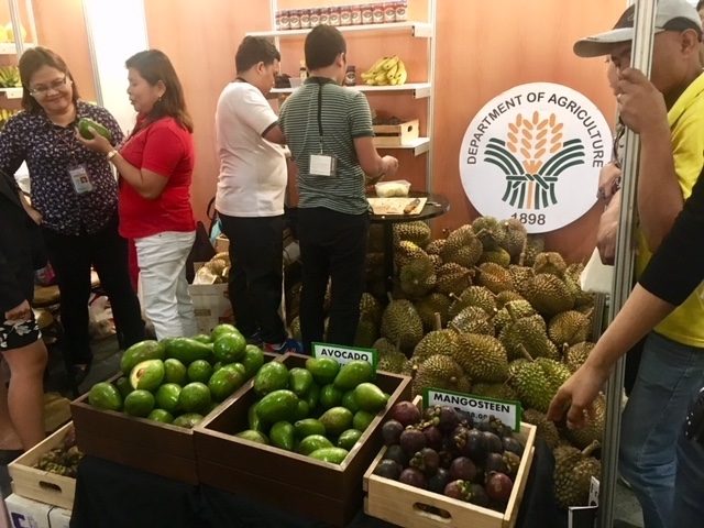 FRESH FRUITS. A booth of the Department of Agriculture in IFEX 2018 showcases mangosteen, avocado, and durian. Photo by Ralf Rivas 