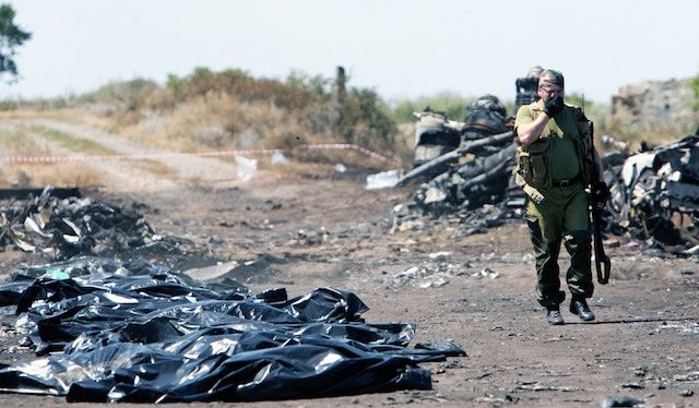 Grieving relatives at MH17 site as Dutch, Australia ready troops