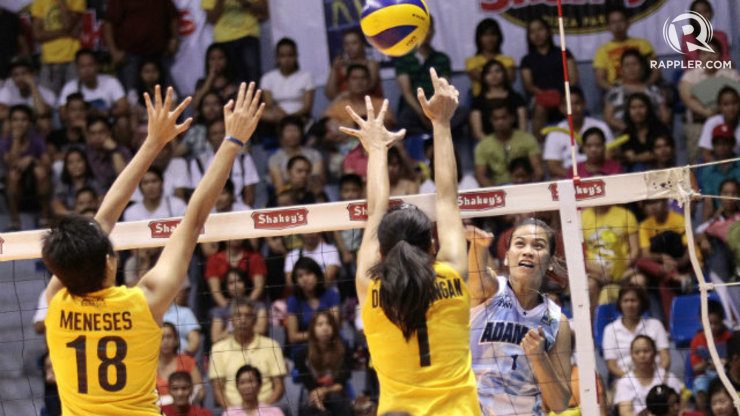Sheila Pineda spikes one of her 11 points past UST defenders. Photo by Josh Albelda/Rappler