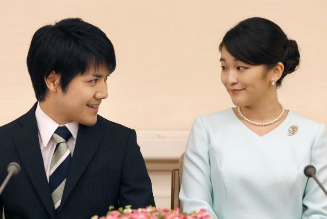 Fevered speculation as Japan princess postpones engagement