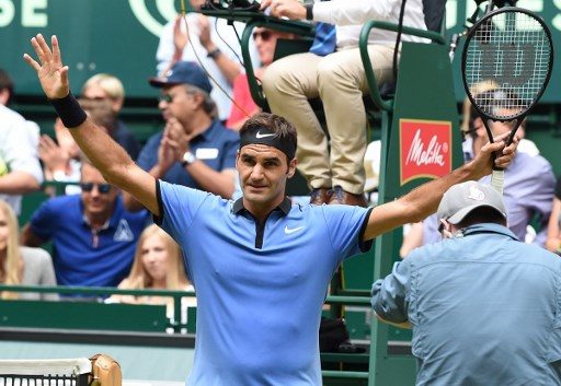 Top of the world: Federer, 36, becomes oldest number one