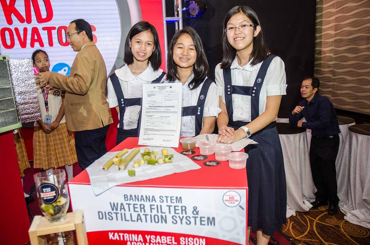 BANANA STEM WATER FILTER AND DISTILLATION SYSTEM. This innovation by Katrina Ysabel C. Sison, Adrianne A. Ong, and Andrea Samantha V. Estrella from St. Scholasticaâs College, Manila aims to help far-flung and disaster-stricken communities by producing a technology that filters and distills water to make it suitable for drinking by using indigenous materials such as banana stems. Photo by Rappler/Rob Reyes  