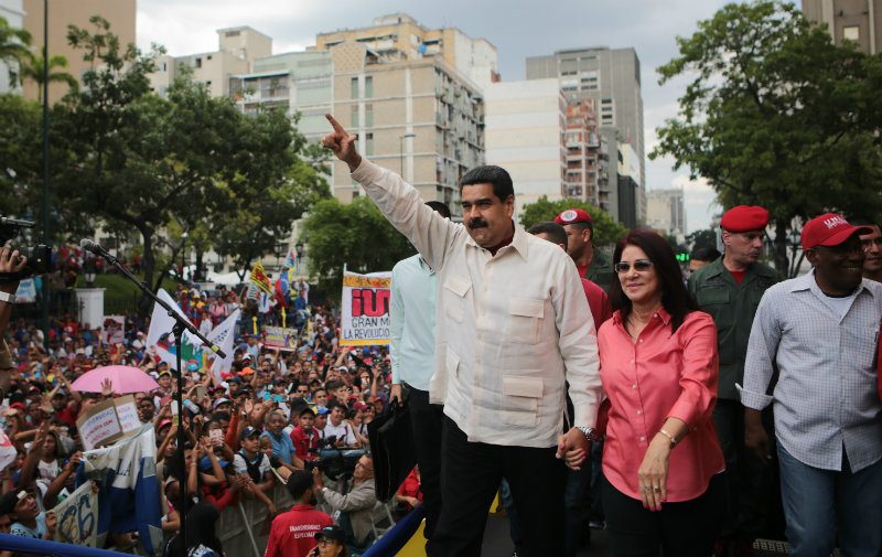 Venezuelan officials and opposition meet mediators over standoff