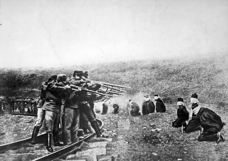 DEATH SQUAD. A World War I execution squad: Austrian soldiers executing Serbians. Photo by Underwood & Underwood/Exact Date Shot Unknow. NARA FILE #: 165-WW-179A-8 WAR & CONFLICT BOOK #: 691. Public Domain/via WikiMedia Commons