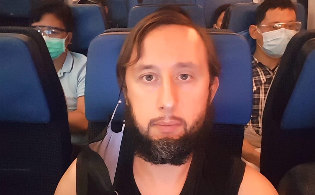 STRANDED. Estonain Roman Trofimov boards a flight departing the Philippines after being trapped in NAIA for 110 days due to grounded flights and lockdown restrictions. Photo from Trofimov's Facebook 