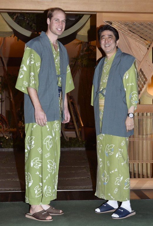 YUKATA, TOO. Britain’s Prince William and Japanese Prime Minister Shinzo Abe wear 'yukata,' or kimono-style pajamas, at a dinner gathering in Koriyama, Japan’s northeastern prefecture of Fukushima on February 28, 2015. AFP photo/Japan pool 